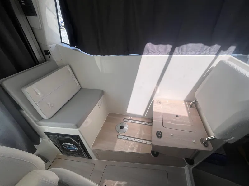 Slide: The Image of Interior seating of 2025 Bayliner Trophy T25 Pilothouse boat. - 12