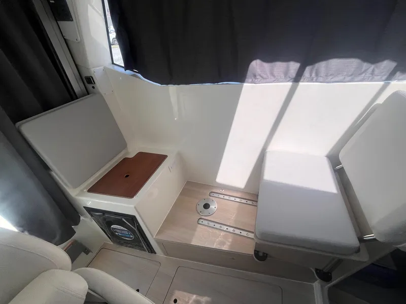 Slide: The Image of Interior seating of 2025 Bayliner Trophy T25 Pilothouse boat. - 14