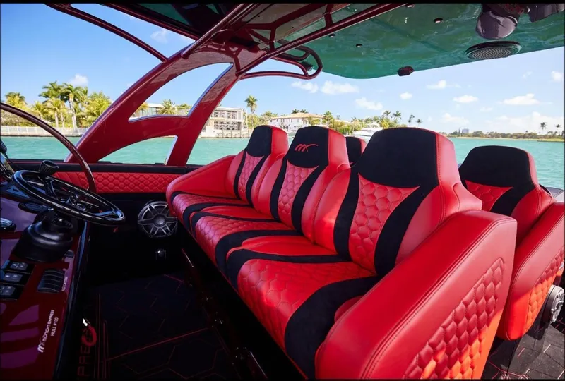 Slide: The Image of Luxurious red and black interior of 2022 Midnight Express 43' Solstice boat. - 30