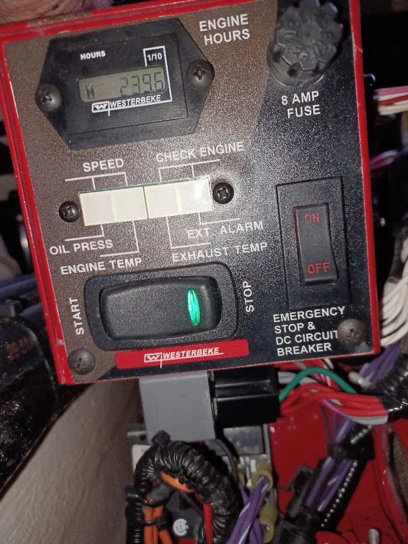 Slide: The Image of Control panel of a 2022 Midnight Express 43' Solstice boat engine. - 34