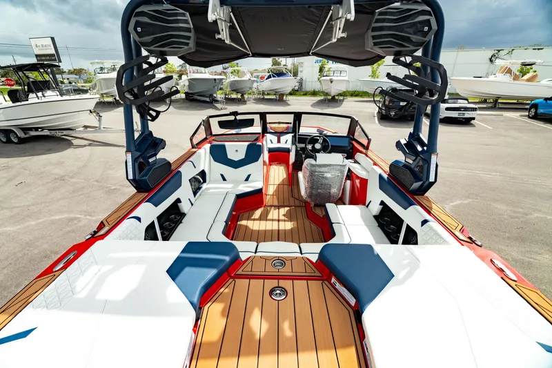 Slide: The Image of 2025 Nautique Super Air Nautique GS20 boat interior with sleek seating and modern design. - 14