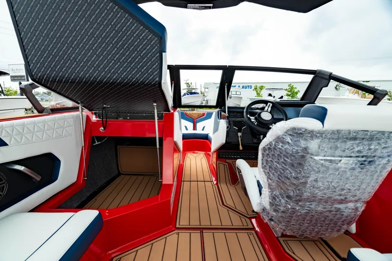 Slide: The Image of Interior of 2025 Nautique Super Air Nautique GS20 boat, featuring modern design and seating. - 28