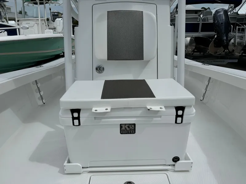 Slide: The Image of 2025 BlackJack 256 Coastal boat interior with seating and storage. - 16