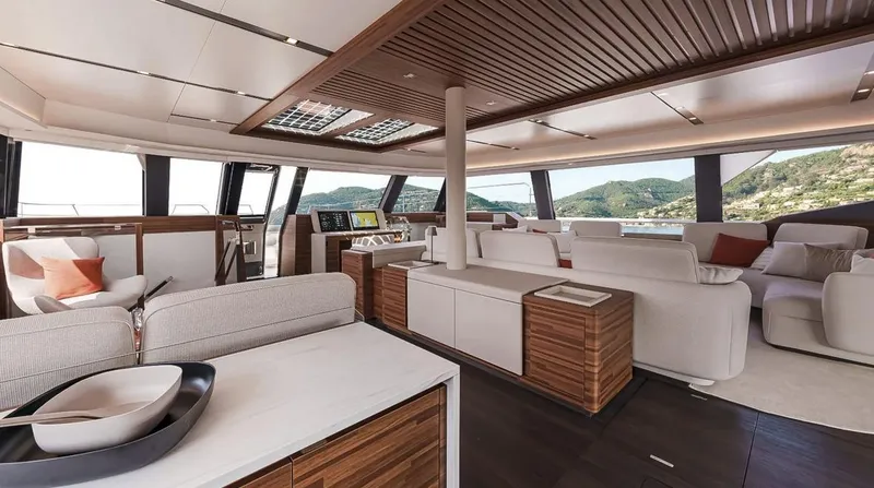 Slide: The Image of Luxurious interior of 2027 Fountaine Pajot Power 80 yacht with modern design and panoramic views. - 15