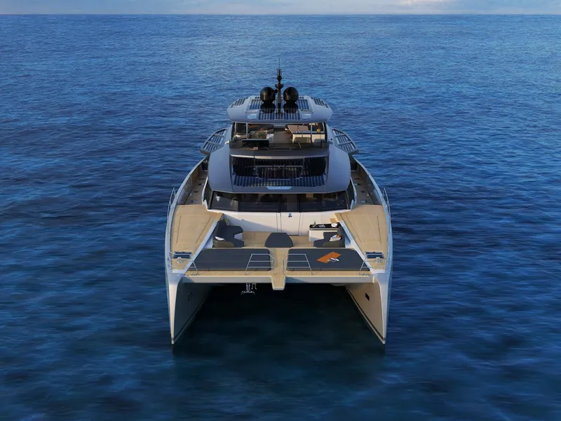 Slide: The Image of 2027 Fountaine Pajot Power 80 yacht cruising on open sea under clear skies. - 2
