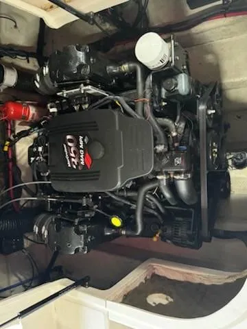 Slide: The Image of 2005 Sea Ray 240 Sundeck engine compartment with MerCruiser 5.0L MPI engine. - 9