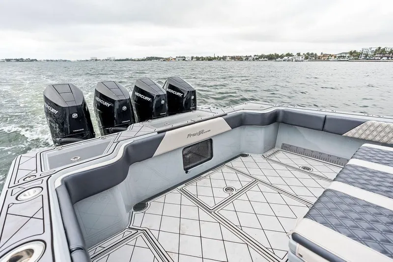 Slide: The Image of 2020 Front Runner 39 CC boat with Mercury engines on open water. - 10