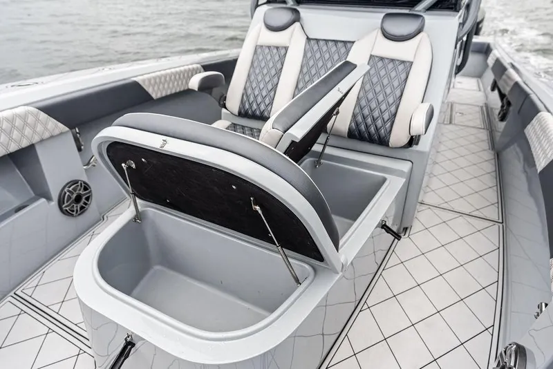 Slide: The Image of 2020 Front Runner 39 CC boat interior with luxury seating and storage compartment. - 21
