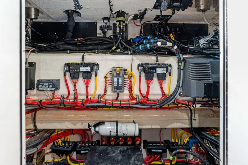 Slide: The Image of 2020 Front Runner 39 CC boat electrical system with organized wiring and components. - 32