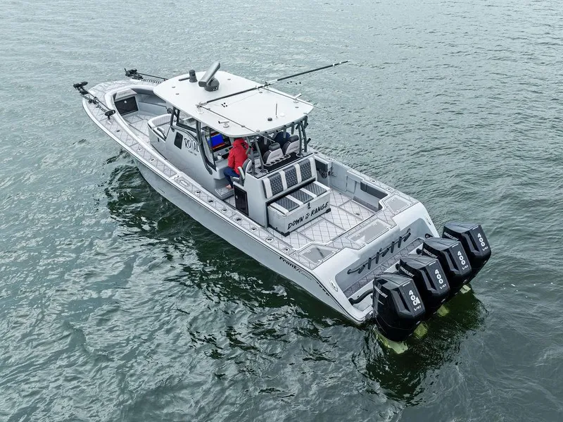 Slide: The Image of 2020 Front Runner 39 CC boat with four engines on water. - 7
