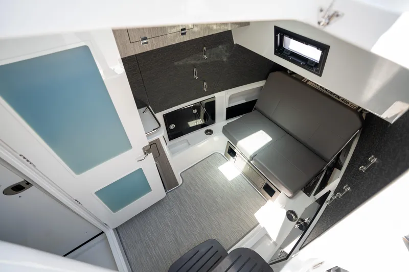 Slide: The Image of 2024 Blackfin 400CC cabin interior with modern seating and sleek design. - 26