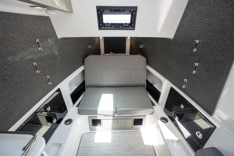 Slide: The Image of 2024 Blackfin 400CC cabin interior with modern seating and storage compartments. - 33