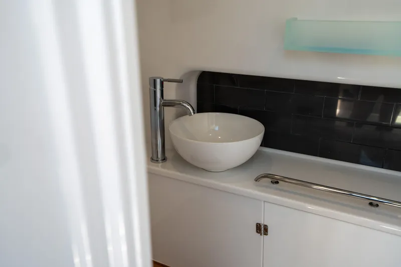 Slide: The Image of Modern bathroom sink with chrome faucet in 2024 Blackfin 400CC boat. - 45