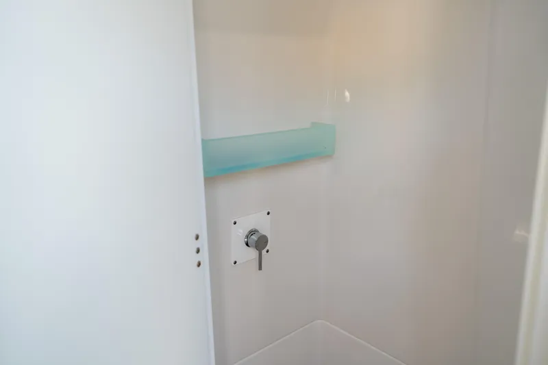 Slide: The Image of Shower area in 2024 Blackfin 400CC boat, featuring a sleek design and modern fixtures. - 49