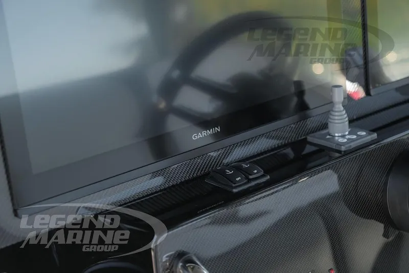 Slide: The Image of Garmin display on 2025 Nor-Tech 340 Sport Center Console boat dashboard. - 19