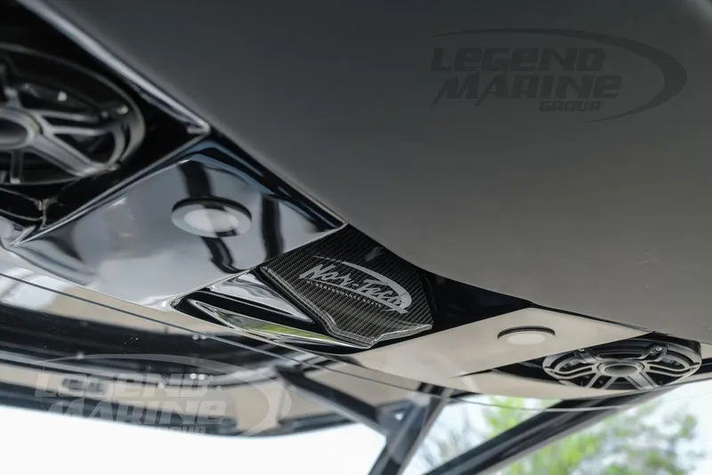 Slide: The Image of 2025 Nor-Tech 340 Sport Center Console, sleek design with advanced audio system. - 21