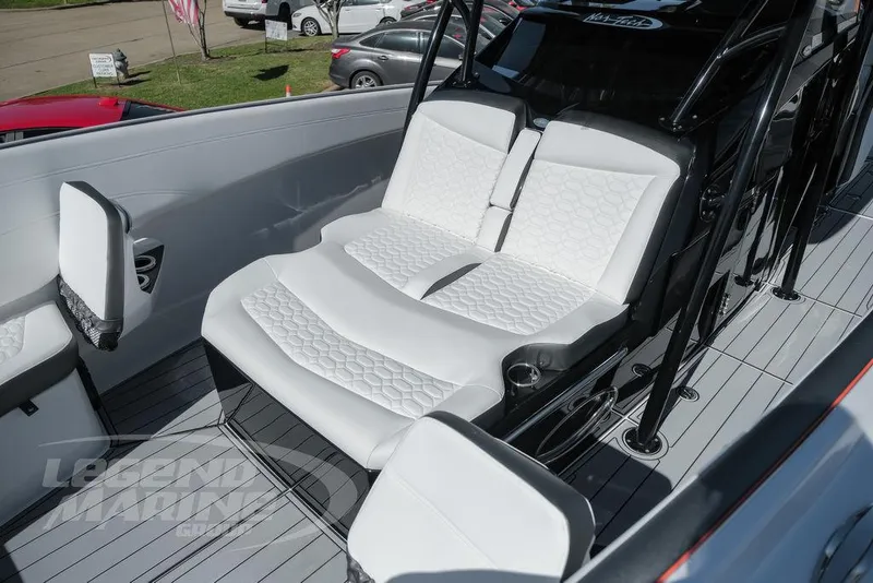 Slide: The Image of 2025 Nor-Tech 340 Sport Center Console with luxurious white seating. - 32