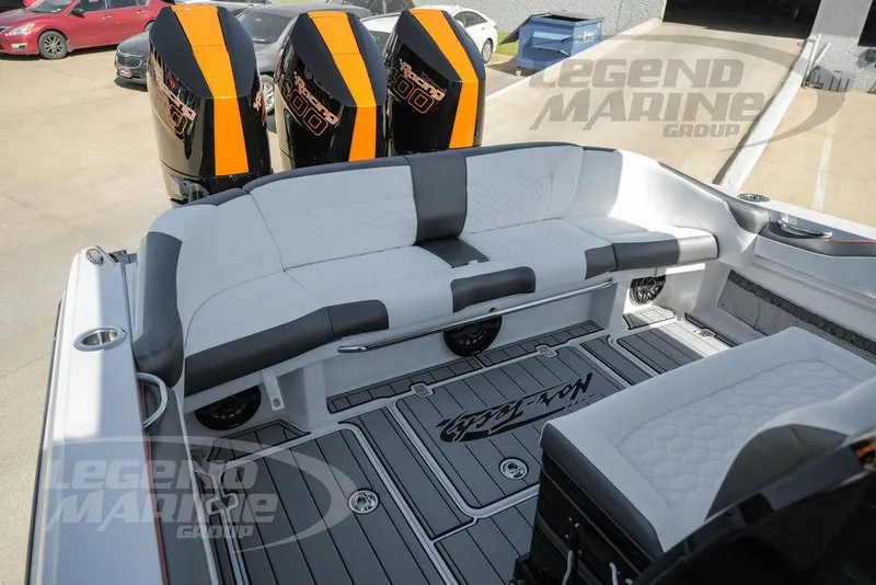 Slide: The Image of 2025 Nor-Tech 340 Sport Center Console with sleek seating and powerful engines. - 46