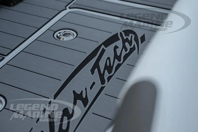 Slide: The Image of Close-up of 2025 Nor-Tech 340 Sport Center Console deck with logo detailing. - 48