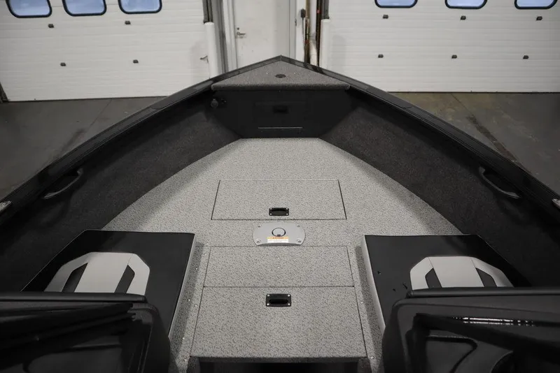 Slide: The Image of 2025 Crestliner 1950 Super Hawk boat interior with storage compartments. - 11