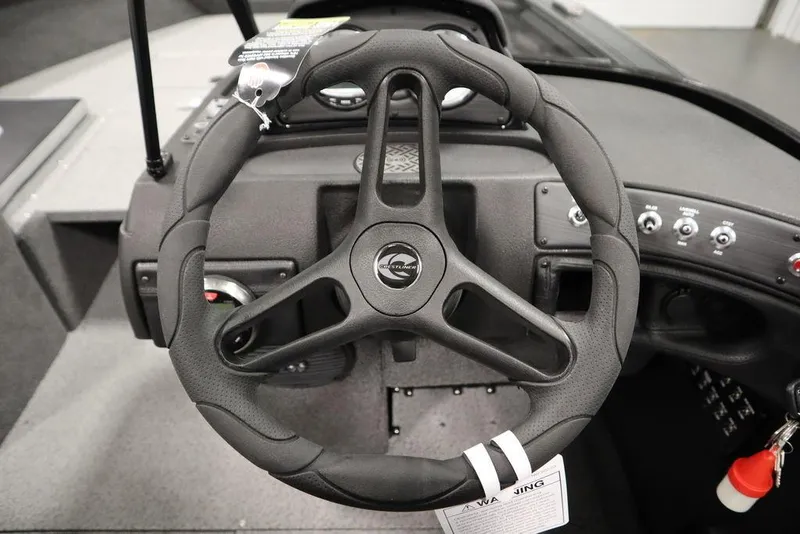 Slide: The Image of 2025 Crestliner 1950 Super Hawk steering wheel and dashboard close-up. - 19