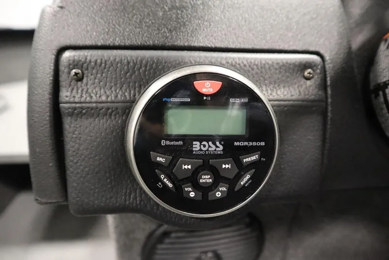 Slide: The Image of Boss audio system in 2025 Crestliner 1950 Super Hawk boat dashboard. - 20