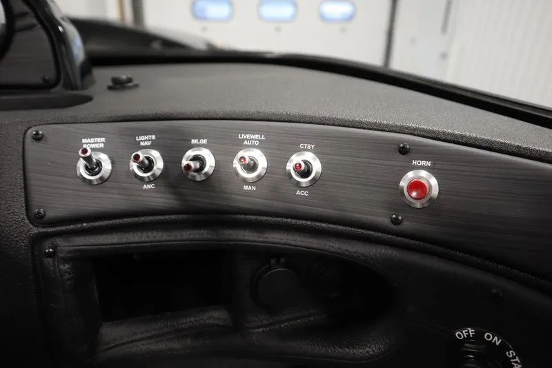 Slide: The Image of Dashboard controls of 2025 Crestliner 1950 Super Hawk boat. - 23