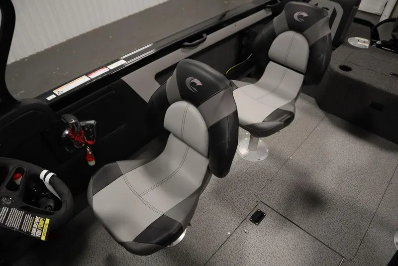 Slide: The Image of 2025 Crestliner 1950 Super Hawk interior with two gray and black seats. - 24