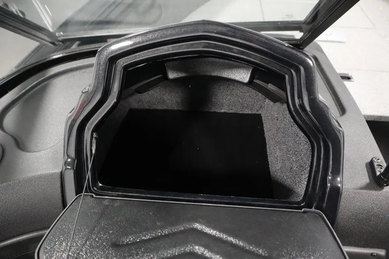 Slide: The Image of 2025 Crestliner 1950 Super Hawk storage compartment, open and empty. - 26