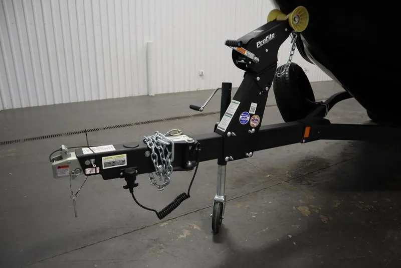 Slide: The Image of 2025 Crestliner 1950 Super Hawk trailer hitch in a garage setting. - 39