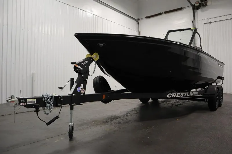 Slide: The Image of 2025 Crestliner 1950 Super Hawk boat on trailer in indoor storage. - 40