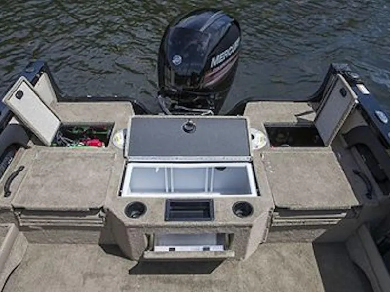 Slide: The Image of 2025 Crestliner 1950 Super Hawk boat interior with storage compartments and Mercury outboard motor. - 46