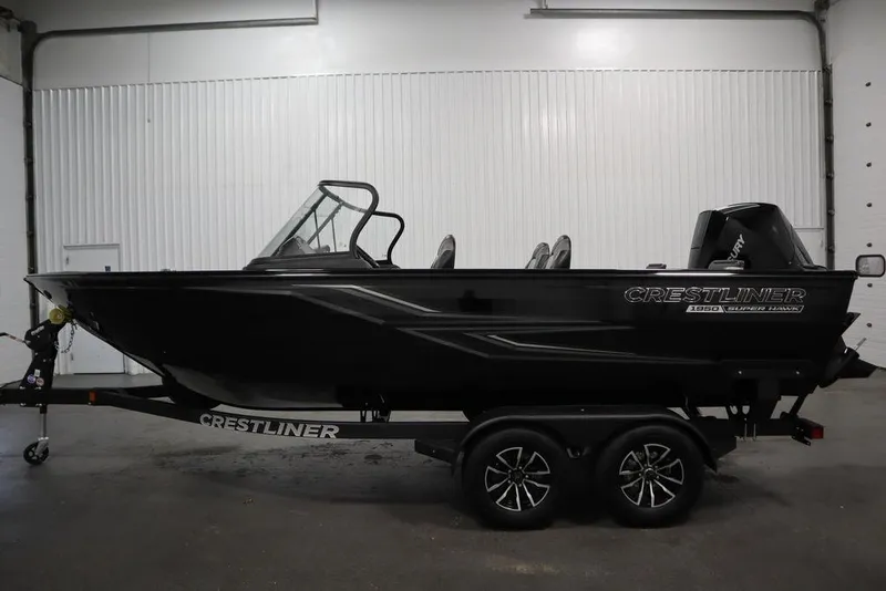 Slide: The Image of 2025 Crestliner 1950 Super Hawk boat on trailer in indoor setting. - 8