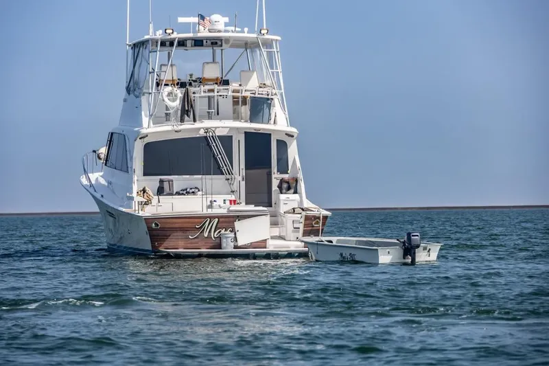 Slide: The Image of 1987 Ocean Yachts 63 Convertible on calm waters. - 3