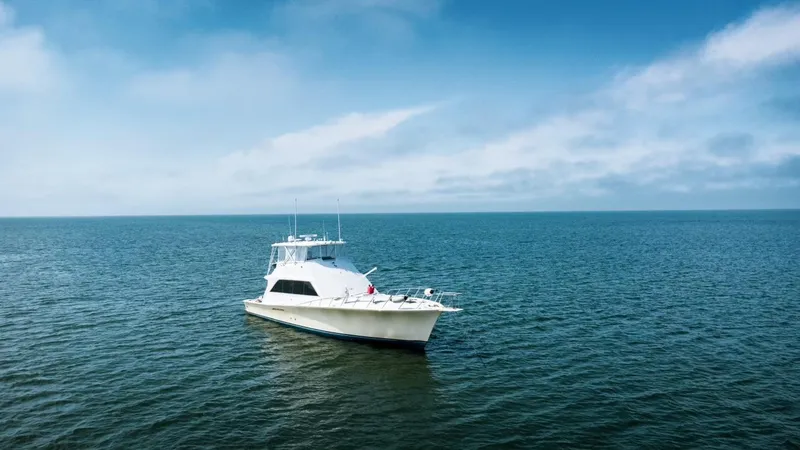 The Image of 1987 Ocean Yachts 63 Convertible on open sea. - 1