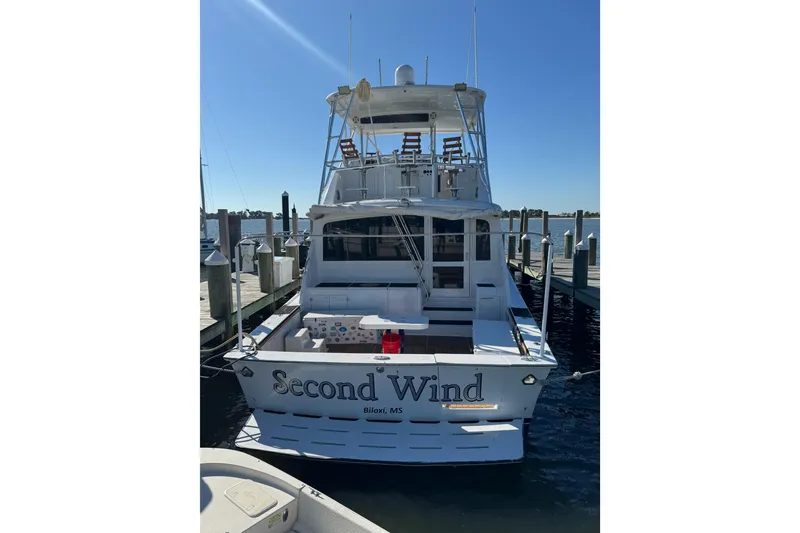 Slide: The Image of 1987 Ocean Yachts 63 Convertible Manns docked, named "Second Wind," in Biloxi, MS. - 28