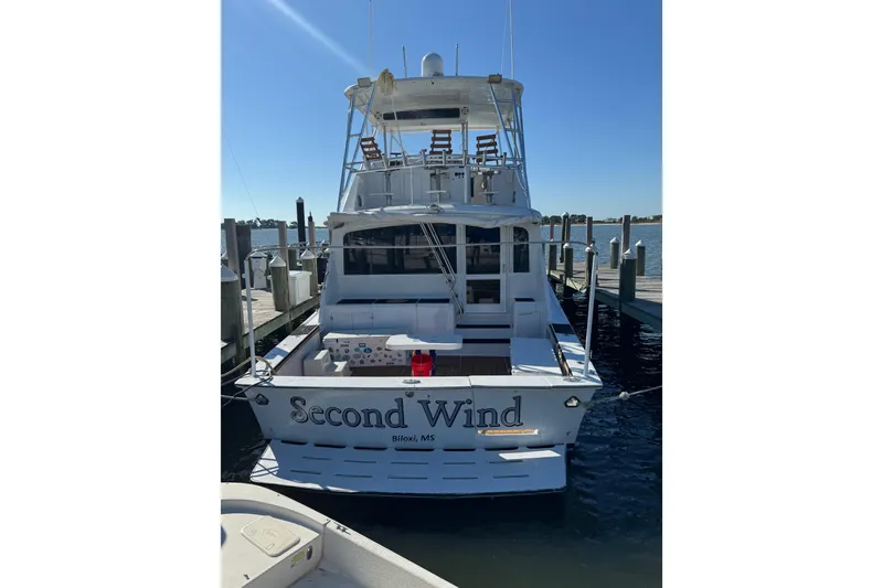 Slide: The Image of 1987 Ocean Yachts 63 Convertible Manns docked, named "Second Wind," in Biloxi, MS. - 29