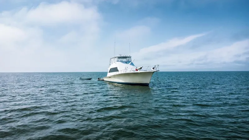 Slide: The Image of Ocean Yachts 63 Convertible Manns 1987 on open sea. - 6