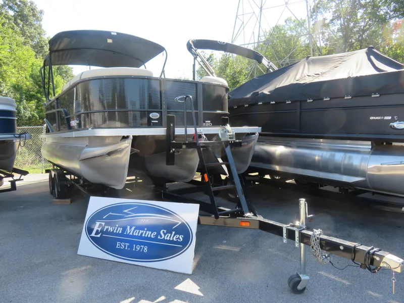 The Image of 2023 Crest Classic LX 220 pontoon boat displayed at Erwin Marine Sales. - 1
