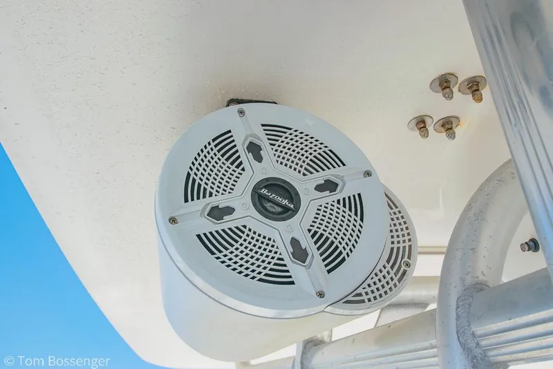 Slide: The Image of Outdoor speaker on a 2010 Sea Hunt Gamefish 29 boat, mounted under a white surface. - 29