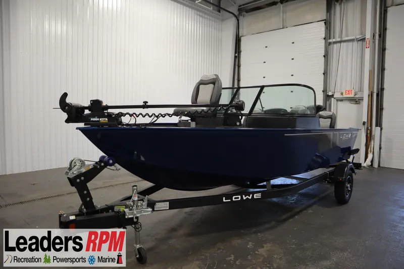 Slide: The Image of 2025 Lowe 1775 FM WT boat in showroom, featuring Minn Kota trolling motor. - 0