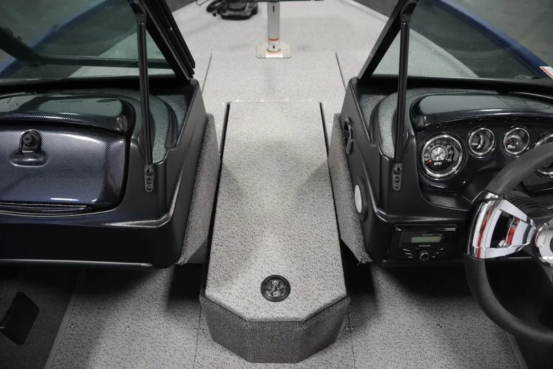 Slide: The Image of 2025 Lowe 1775 FM WT boat interior with dashboard and steering wheel. - 16