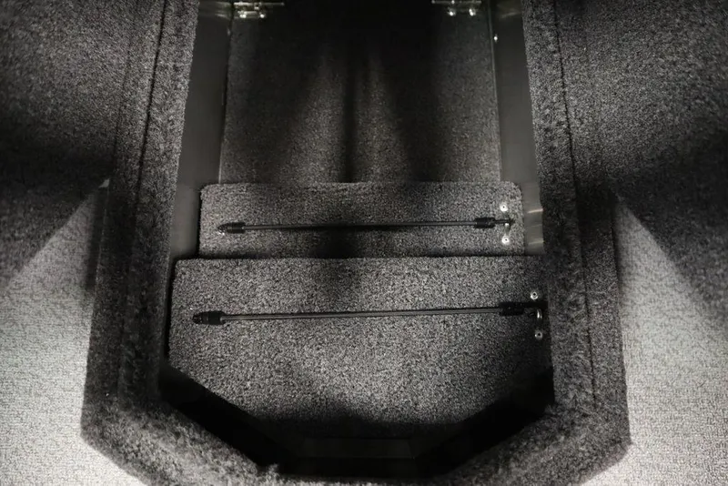 Slide: The Image of Interior view of 2025 Lowe 1775 FM WT boat storage compartment. - 19