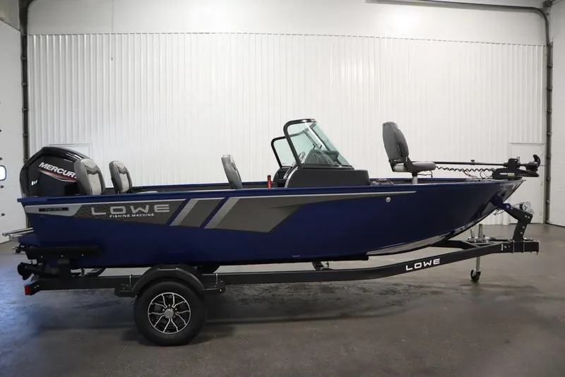 Slide: The Image of 2025 Lowe 1775 FM WT fishing boat with Mercury engine in a showroom. - 4