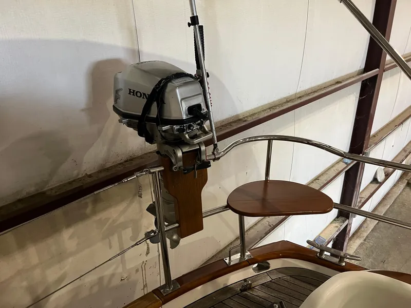 Slide: The Image of Outboard motor mounted on a 2003 Fantasi 44 Pilot House yacht. - 23