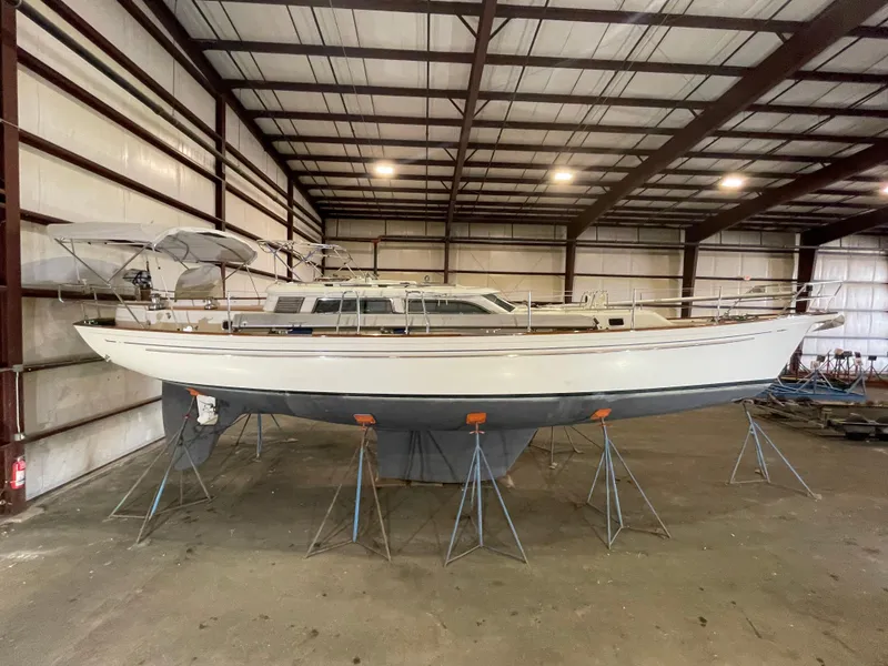 Slide: The Image of Fantasi 44 Pilot House 2003 sailboat in indoor storage on stands. - 7