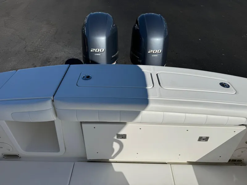 Slide: The Image of 2017 Regulator 25 CC boat with twin 200 horsepower engines. - 15