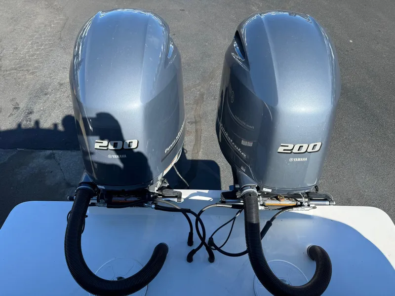 Slide: The Image of Twin Yamaha 200 outboard engines on a 2017 Regulator 25 CC boat. - 16