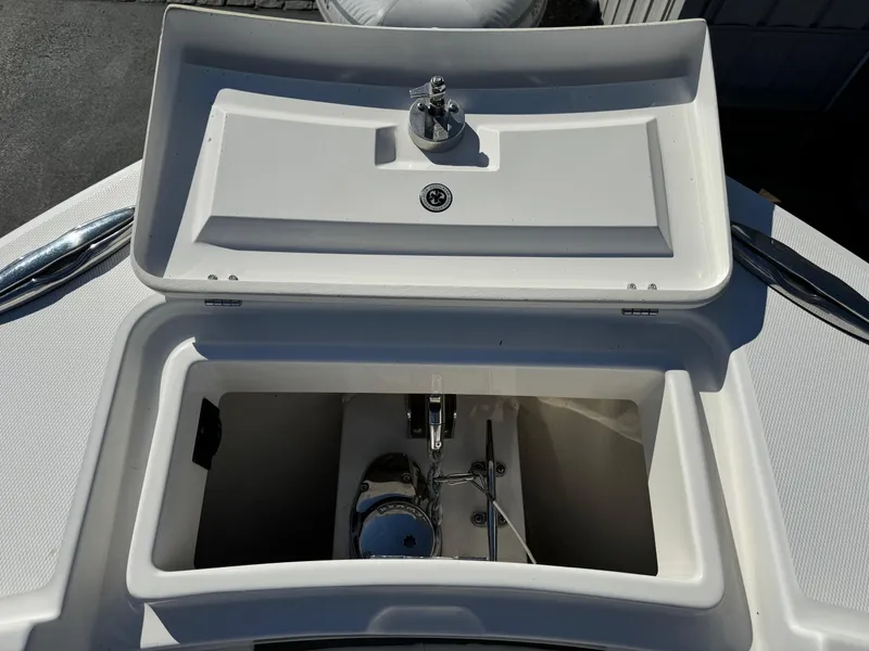 Slide: The Image of Open anchor compartment on 2017 Regulator 25 CC boat. - 5