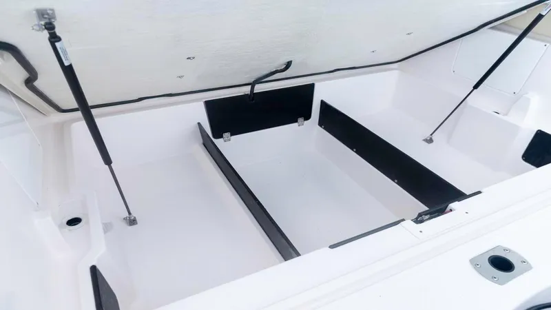 Slide: The Image of Spacious storage compartment in 2025 Regal LX6 boat. - 22